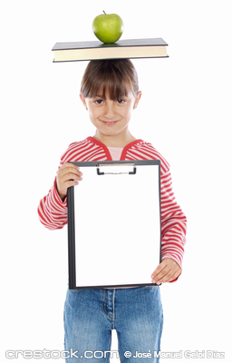 Young girl balancing a book and an apple on head